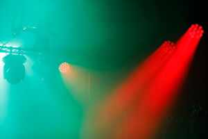 Red spotlights and green smoke